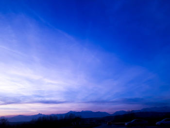 Scenic view of vapor trails in sky