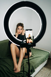 Man photographing with mobile phone