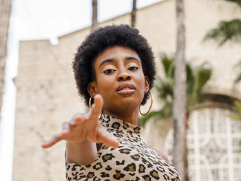 Portrait of a young woman looking away