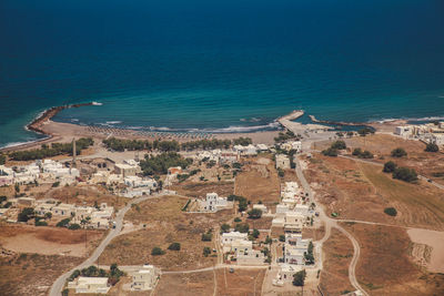 Aerial view of landscape and sea on sunny day