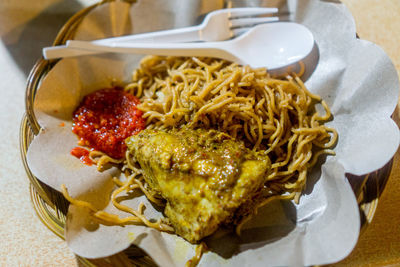 High angle view of pasta in plate on table