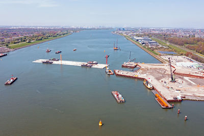 High angle view of boats moored at harbor