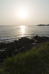 Scenic view of sea against clear sky