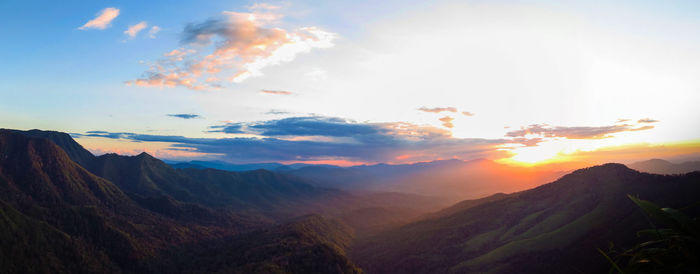 Scenic view of mountains against sky during sunset