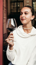 Portrait of a woman drinking glass