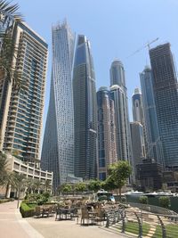 Low angle view of modern buildings against clear sky