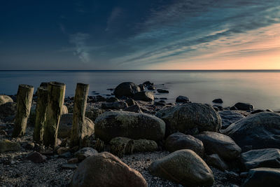 Old groynes on the beach of the baltic sea