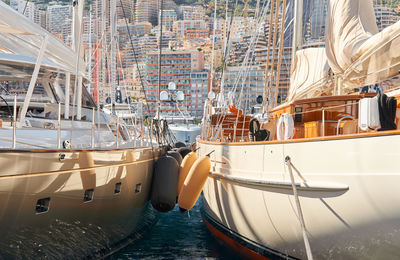 Boats moored at harbor