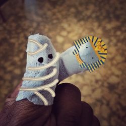 Low section of person holding toy