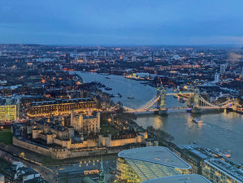 High angle view of river amidst buildings in city