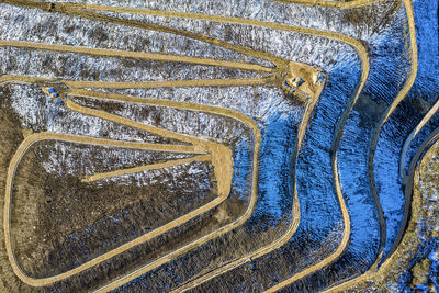 Aerial top view of a city garbage dump. waste disposal facility