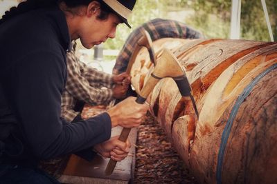 Man working on wood