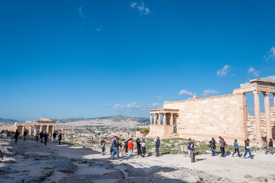 Tourists walking in the acropolis