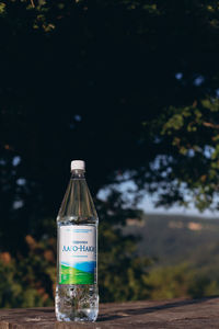 Close-up of glass bottle on table
