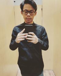 Young man using smart phone