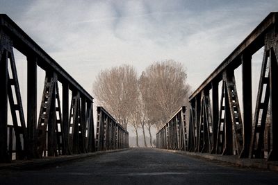 View of bridge over road against sky