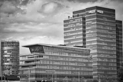 Low angle view of modern buildings against sky