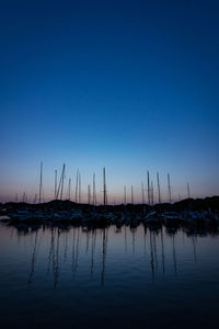 Scenic view of sea against sky at night