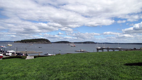 Scenic view of sea against cloudy sky