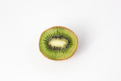 Close-up of lemon against white background