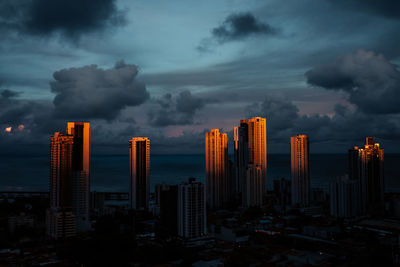 Panoramic view of city against sky at dusk