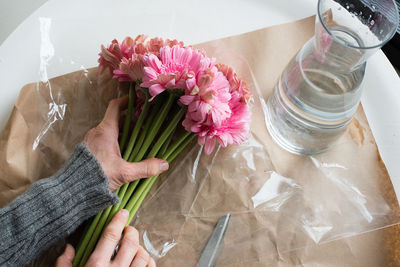 Close-up high angle view of flowers on table