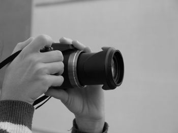 Close-up of hand holding camera