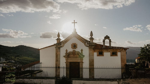 Facade of building against sky
