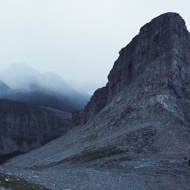 mountain, tranquil scene, tranquility, scenics, mountain range, beauty in nature, landscape, nature, clear sky, sky, rock - object, non-urban scene, rock formation, geology, physical geography, remote, rocky mountains, idyllic, copy space