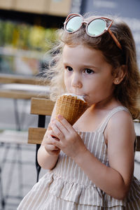 Close-up of girl eating food