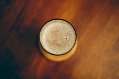 High angle view of beer glass on table