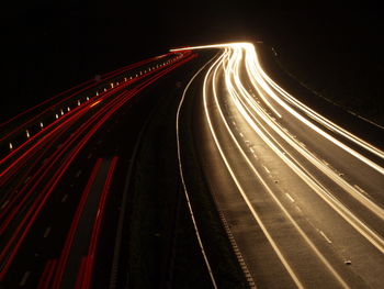 Light trails on road at night