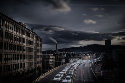 High angle view of road amidst buildings in city