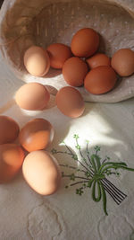 High angle view of eggs in container on table