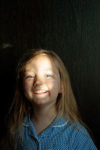 Portrait of smiling young woman