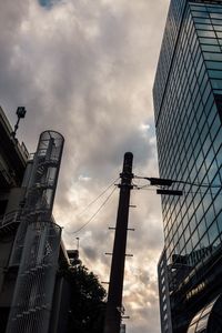 Low angle view of modern buildings against sky