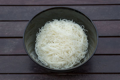 High angle view of rice in bowl on table