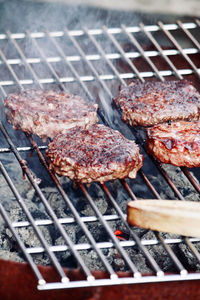 Close-up of meat on barbecue grill