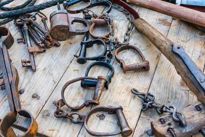 High angle view of handcuffs on table