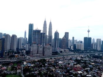 View of buildings in city against sky