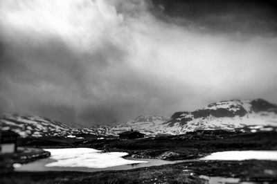 Scenic view of mountains against sky during winter