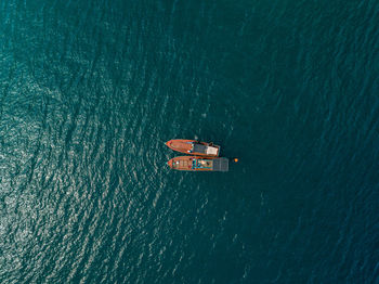 High angle view of ship sailing in sea