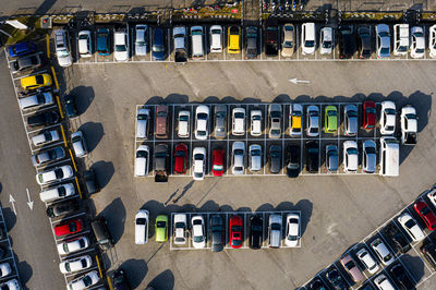 High angle view of cars parked in row