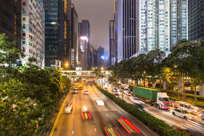 Traffic on road in city at night