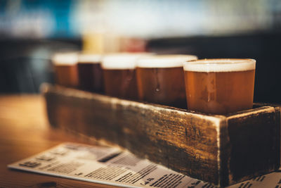 Close-up of beer flight on table