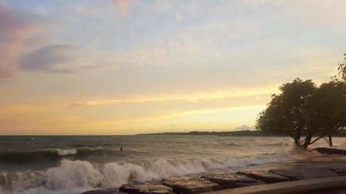 Scenic view of sea against sky during sunset