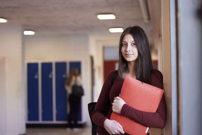 Teenage girl looking at camera