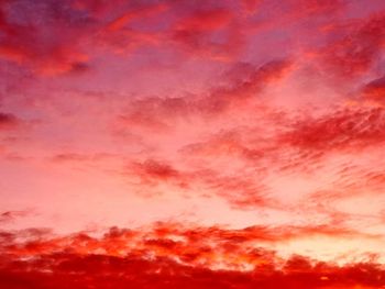 Low angle view of dramatic sky during sunset