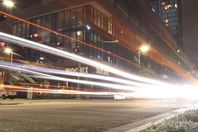 Light trails on city street at night