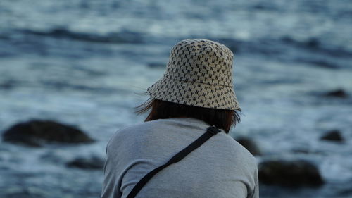 Rear view of woman looking away